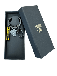 Portachiavi Lamborghini in acciaio con targhette in una elegante scatola nera.