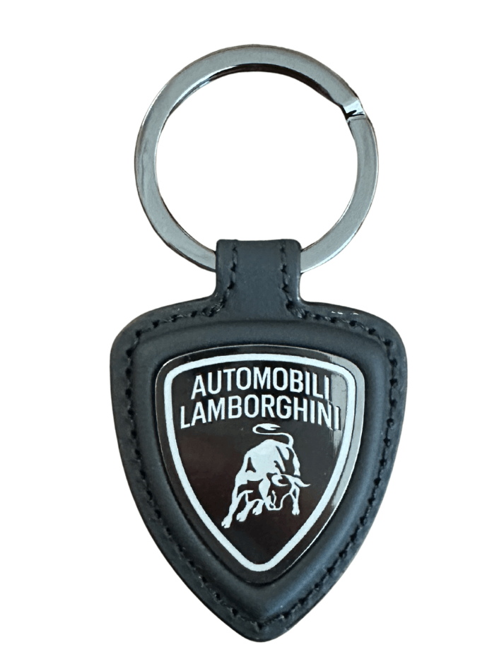Portachiavi Automobili Lamborghini in pelle con logo, accessorio premium per appassionati di auto di lusso.
